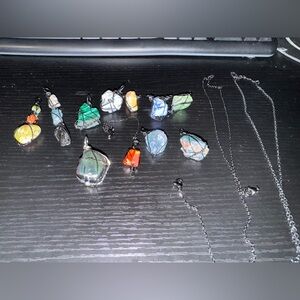 Custom made jewelry (stones) wrapped in black chain/wire